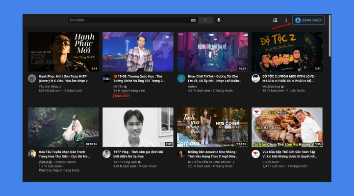 Trang chủ YouTube hiển thị trên trình duyệt máy tính với nút Đăng nhập ở góc trên bên phải và chọn tài khoản Gmail để đăng nhập.